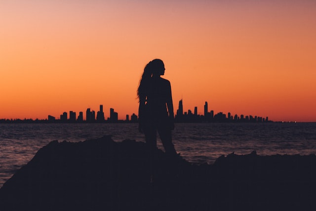 Powerful woman overlooking skyline