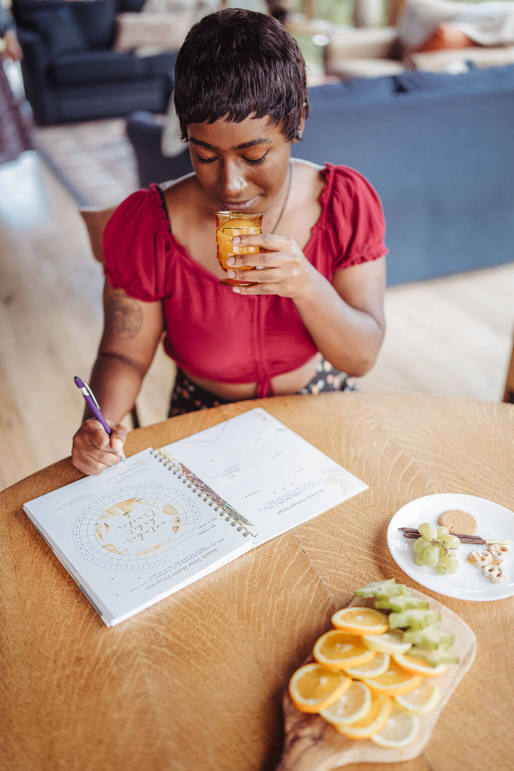 a woman mindfully habit tracking